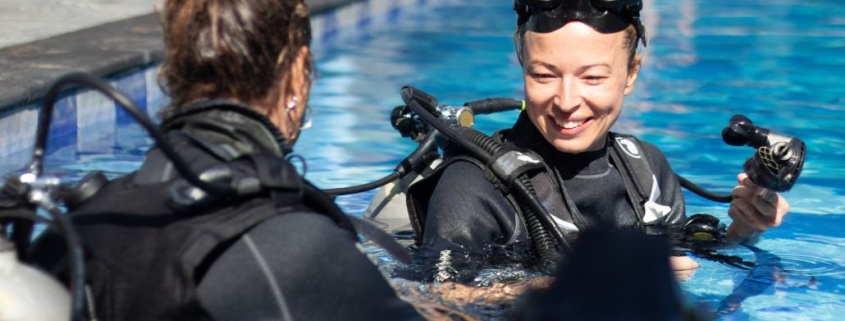 two scuba diver in pool